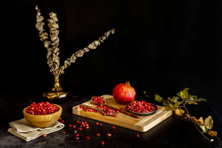 Punica granatum, commonly called pomegranate, native to the region from Iran to the Himalayas, has been cultivated since ancient times throughout the Mediterranean basinの写真素材