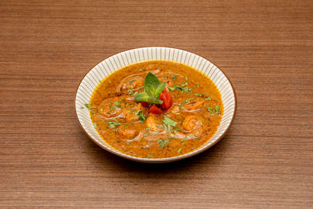 Prawn curry, is a typical curry dish of Burmese cuisine, Indonesian cuisine in Indonesia, Indo-Portuguese cuisine in India and Portugal, Mozambican cuisine in Mozambique and Thai cuisine in Thailandの写真素材