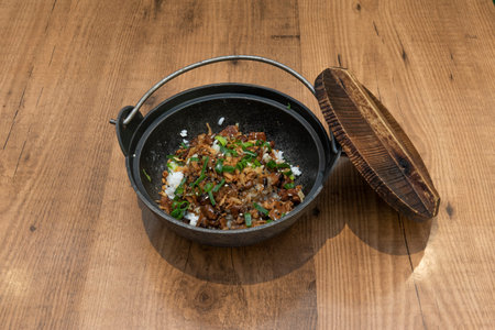 Rice bowl with Korean meat in metal bowl