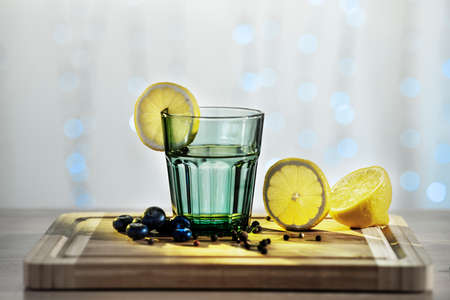 The drink called in English gin tonic is a cocktail made up of gin and tonic water served with iceの写真素材