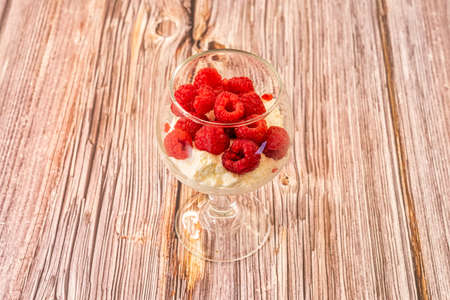 the red raspberry, is an ether formed by several drupes, like the black raspberry and the blue raspberry native to Americaの写真素材
