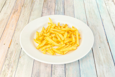 Tapa of typical preparation of the bars of Spain that consists of potatoes cut into large cubes,...
