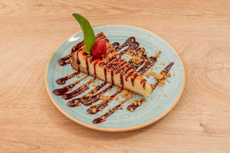 New York Cheesecake, this easy and famous cheesecake where they exist. A dessert with history in the Big Apple that can be served alone or with a berry sauceの写真素材