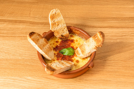 Provolone I prepare it in the oven, ... The rich melted cheese mixed with the Italian tomato sauce, a spectacleの写真素材