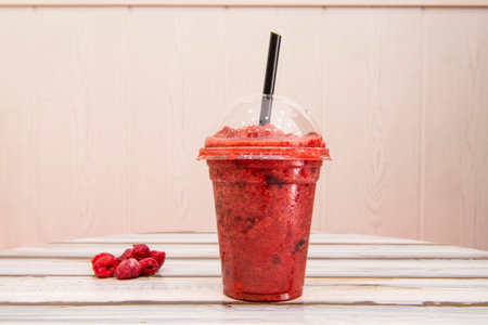 A smoothie is a fruit shake marketed with this appellation. It is a non-alcoholic creamy drink prepared from fruit chunks and juices, concentrated or frozen, traditionally mixed with dairy products.の写真素材