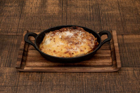 Instead of thick layers of ricotta and mozzarella cheese, lasagna bolognese features delicate layers of fresh pasta, spinach is traditional, yet simpleの写真素材