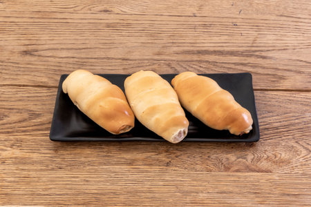 cachito is a typical roll of the gastronomy of Venezuela. It is part of the breakfast of...