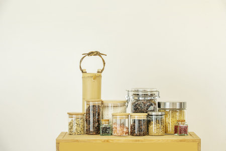 Spice and seasoning jars on bamboo wooden box