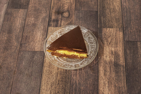 Grandma's cake is a biscuit cake that has one or two layers of pastry cream as a filling instead of...