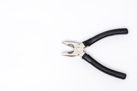 The pliers, also called a clamp, is a manual tool whose uses range from holding parts to cutting or molding different materialsの写真素材