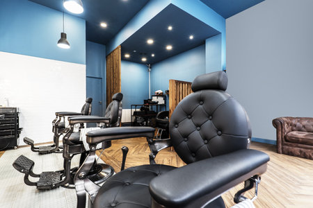 A brand new and cool seat in a gentlemen's barbershopの写真素材