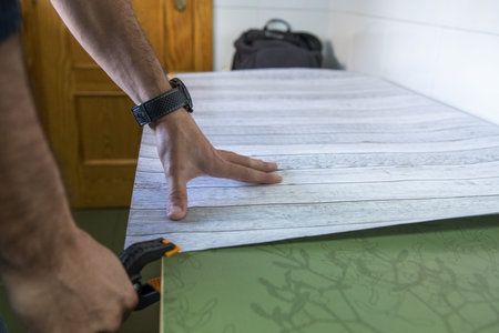 Preparing a set to photograph objects on a table