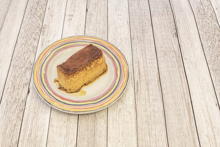The flan is a dessert made with a custard, having as main ingredients whole eggs, milk and sugar, which is then refrigerated to obtain a creamy and gelatinous textureの写真素材