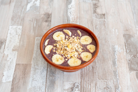 It is a typical Brazilian dish made with the frozen and crushed fruit of the Acai palm tree from the Amazon region. For its nutritional contributions, acai is highly appreciated by athletesの写真素材