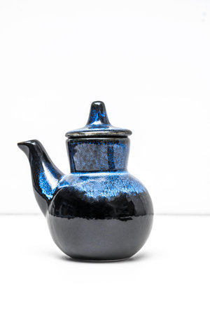 A Japanese-style porcelain jar used as a container for dispensing soy sauceの写真素材