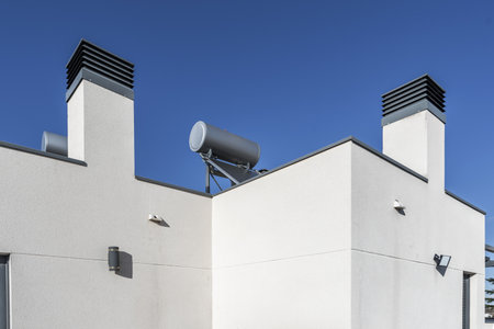 Roof on the attic floor of a single-family home with a water heater system with photovoltaic panelsの写真素材