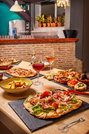 Italian antipasti snacks served on a table in a restaurant.