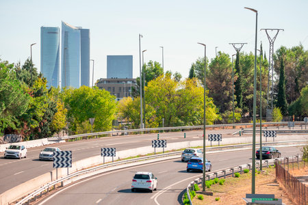 Motorways provide the infrastructure necessary for vehicles to circulate efficiently and safely, while vehicles are the users of these roads.の写真素材