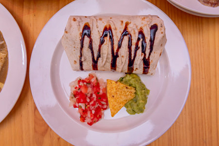 Mexican cuisine has been influenced by and in turn has influenced the cuisines of other cultures, such as American, Spanish, French, and Italianの写真素材