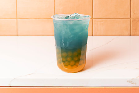 Bubble tea, also known as boba tea or pearl tea, is much more than a simple beverage; it's a global cultural phenomenon that has captivated millions with its unique combination of textures and flavorsの写真素材