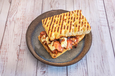 Although often compared to pizza for its flat shape and cooking method, focaccia is its own entity,の写真素材