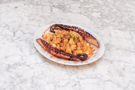 Its texture and ability to bring out the octopus's flavor without over-salting it are ideal