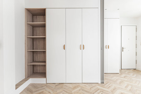 Bedroom wardrobe with deep drawer system and secret compartments for maximum storageの写真素材