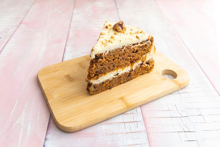 Carrot Cake with Lemon Glaze: A contrast between the spices of the sponge cake and the freshness of the glazeの写真素材