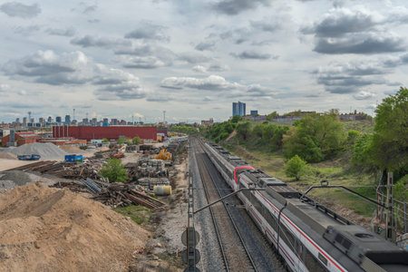 Track section on a steel viaduct with cross braces, crossing a valley with panoramic views of the...