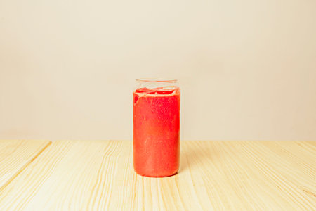 swirl of antioxidants and freshness, where strawberries, raspberries, and cherries mix to create a creamy, velvety texture, topped with whole fruit and a few mint leavesの写真素材