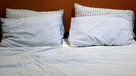 couple pillow on bedroomの写真素材