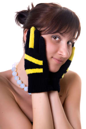The lady in black-yellow gloves looks forward. Isolatedの写真素材