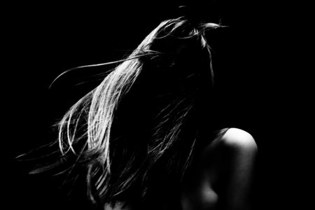 Studio shot. Black background. BW photo.の写真素材