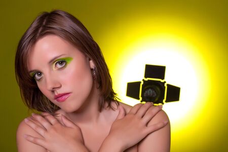 Beautiful girl. Studio shot. Green back ground.の写真素材