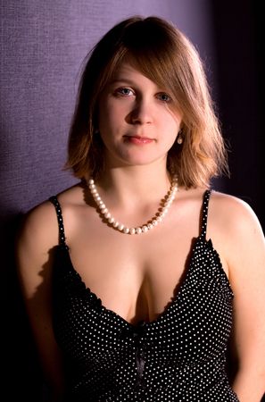 Nice girl ad black wall.の写真素材