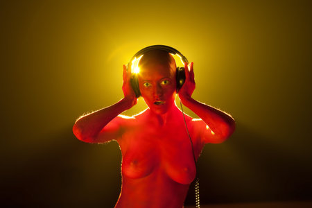 Girl in headphones. High textured skin.の写真素材