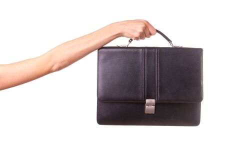 Woman hands and suitcase. Isolated on white.の写真素材
