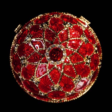 Faberge egg. Isolated on black.の写真素材