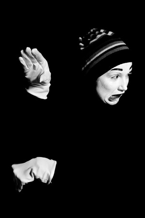 Street mime. Isolated on black.の写真素材
