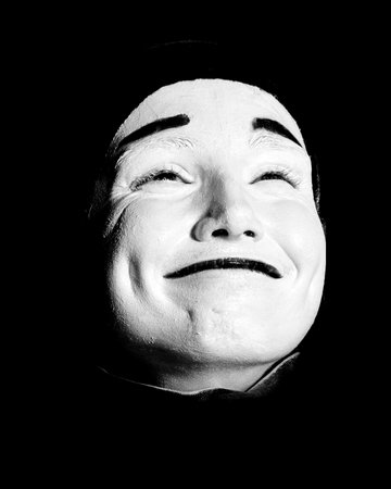 Street mime. Isolated on black.の写真素材