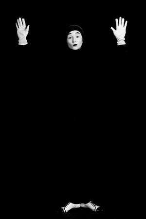 Street mime. Isolated on black.の写真素材