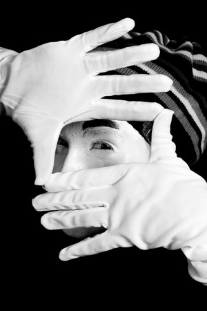 Street mime. Isolated on black.の写真素材