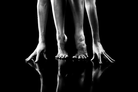 Body parts. Hand and Legs.  On black background.の写真素材