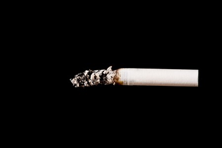Cigarette. Isolated on black. Closeup.の写真素材