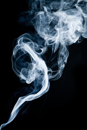 Tobacco smoke. On black background.の写真素材