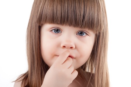 Beautiful child portrait. Isolated on white.の写真素材