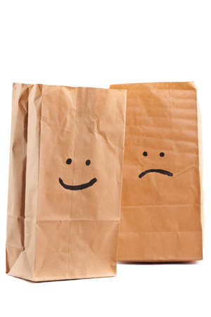Smiling paper bag. Concept. Isolated on white.の写真素材