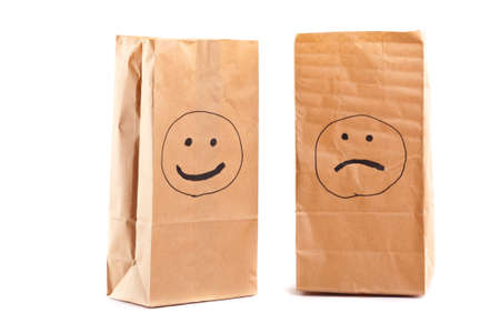 Smiling paper bag. Concept. Isolated on white.の写真素材
