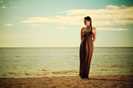 Beautiful fashionable model on the beachの写真素材