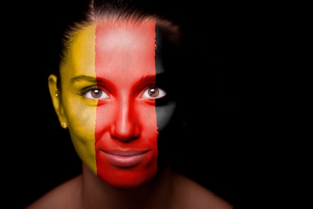 Portrait of a woman with the flag of the Germanyの写真素材